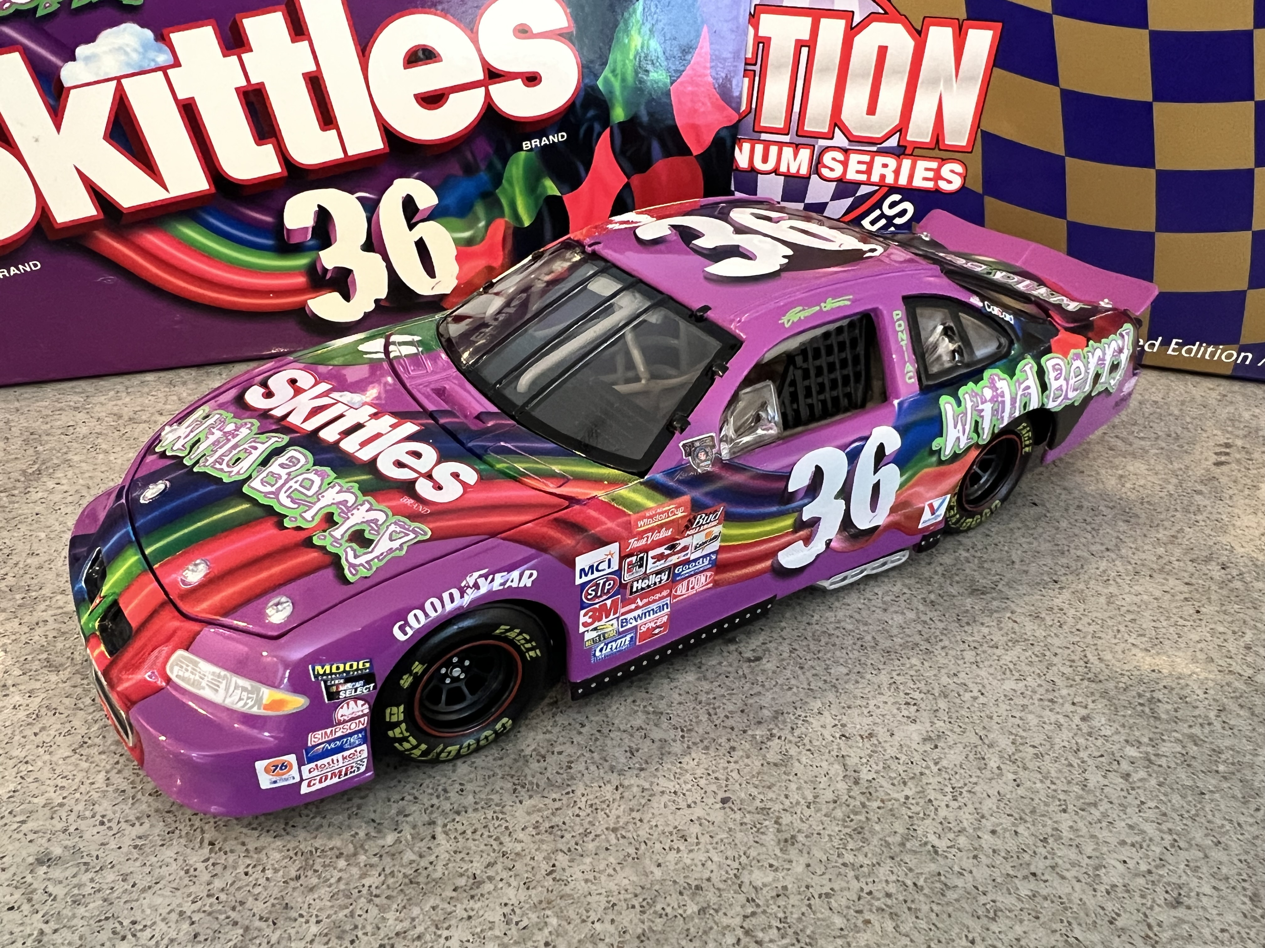 1998 Ernie Irvan #36 Wildberry Skittles Pontiac Action 1:24